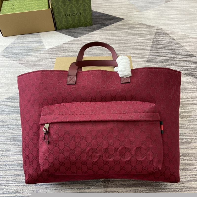G*u*i shopping bags